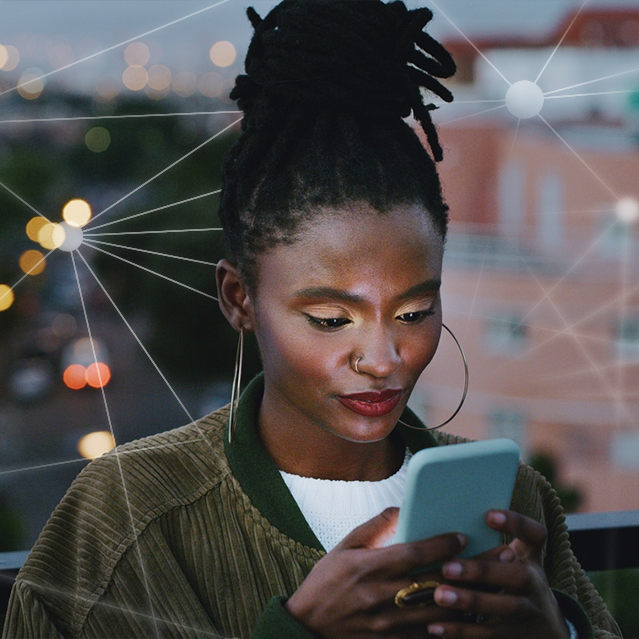 A woman using text encryption on her phone